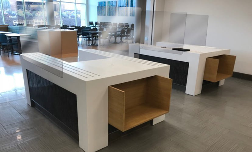 office desk with plexiglass breath guards